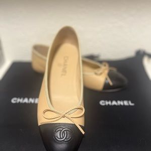 Classic Chanel ballet flats in nude and black. Beautiful.